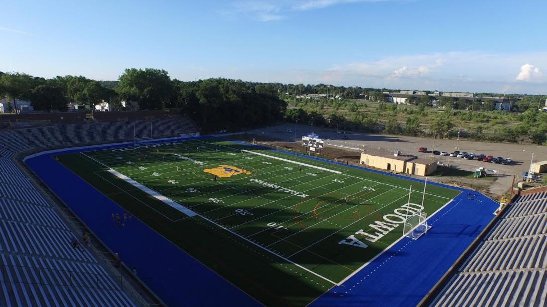 A aerial view of Atwood Stadium, owned by Kettering University. It has a green field with a blue border.